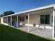 Side exterior with covered patio area, perfect for enjoying the outdoors and relaxing in a peaceful setting at 1710 7Th Sw St # 85, Ruskin, FL 33570