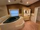 Bathroom features a jetted tub and vanity area at 2033 Aaron Pl, Clearwater, FL 33760