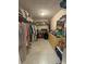 Spacious walk-in closet with ample shelving and storage space for clothes and accessories at 2033 Aaron Pl, Clearwater, FL 33760