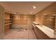 Walk-in closet with ample shelving and storage space at 2033 Aaron Pl, Clearwater, FL 33760