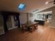 Dining room area includes hardwood floors and sliding glass doors to the backyard at 2033 Aaron Pl, Clearwater, FL 33760