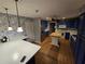 Spacious kitchen with stainless steel appliances, tile backsplash and white countertops at 2033 Aaron Pl, Clearwater, FL 33760