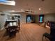 Expansive living room with hardwood floors, skylights, and generous seating area at 2033 Aaron Pl, Clearwater, FL 33760
