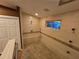 Shower features multiple shower heads and a seat at 2033 Aaron Pl, Clearwater, FL 33760