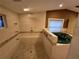 Shower features multiple shower heads and a jetted tub nearby at 2033 Aaron Pl, Clearwater, FL 33760