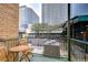 Balcony overlooks city buildings and greenery at 215 Central Ave # 2B, St Petersburg, FL 33701