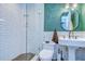 Stylish bathroom featuring white subway tile, a modern vanity, and a glass-enclosed shower at 215 Central Ave # 2B, St Petersburg, FL 33701