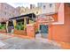 Intimate outdoor patio space with exposed beams and ample plants at 215 Central Ave # 2B, St Petersburg, FL 33701
