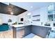 Open concept kitchen with stainless appliances flows seamlessly into the living area at 215 Central Ave # 2B, St Petersburg, FL 33701