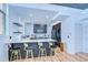 Modern kitchen boasts sleek countertops, bar seating, and stainless appliances at 215 Central Ave # 2B, St Petersburg, FL 33701