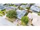 Aerial view of the house shows the full shape and landscaping of the property at 21608 Wytheville Way, Lutz, FL 33549