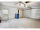 Spacious two car garage with automatic door opener, side door and overhead lighting at 21608 Wytheville Way, Lutz, FL 33549