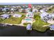 Waterfront home boasts a pool, firepit, boat dock, and easy access to waterway at 24197 Treasure Island Blvd., Punta Gorda, FL 33955