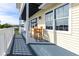 Open-air balcony includes outdoor seating to enjoy the canal view at 24197 Treasure Island Blvd., Punta Gorda, FL 33955