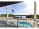 Balcony view of the canal leading to the sea, boat dock, and an in-ground pool at 24197 Treasure Island Blvd., Punta Gorda, FL 33955