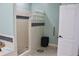Well-lit bathroom featuring a walk-in shower with glass block detail and stylish fixtures at 24197 Treasure Island Blvd., Punta Gorda, FL 33955