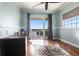 Bright home office space with natural lighting and balcony access overlooking serene views at 24197 Treasure Island Blvd., Punta Gorda, FL 33955