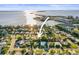 Aerial view showing the home's location on the water in a desirable neighborhood at 2479 Trade Winds Dr, Dunedin, FL 34698