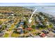 A lovely residential street featuring mature landscaping and sidewalks, with easy access to the water at 2479 Trade Winds Dr, Dunedin, FL 34698