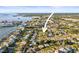 Real estate boasting access to a bay via a canal and plenty of sunshine throughout the neighborhood at 2479 Trade Winds Dr, Dunedin, FL 34698