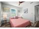 Relaxing bedroom with two bedside tables, warm lighting, and stylish décor at 2479 Trade Winds Dr, Dunedin, FL 34698