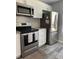 Well-appointed kitchen features stainless steel appliances and ample counter space for meal preparation at 2714 60Th Avenue W Ter # 12D, Bradenton, FL 34207