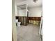 Bright bathroom area with tile flooring and modern fixtures, partially renovated and ready for upgrades at 3207 S De Bazan Ave, St Pete Beach, FL 33706