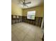 Renovation opportunity: Bedroom with tile floor, exposed frame, offering a blank canvas for customization at 3207 S De Bazan Ave, St Pete Beach, FL 33706