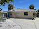 Charming single-story home with light-colored paint, chimney, and a well-maintained front yard at 3207 S De Bazan Ave, St Pete Beach, FL 33706