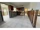 A kitchen undergoing renovations. Tile flooring and an open layout offer potential for redesign and customization at 3207 S De Bazan Ave, St Pete Beach, FL 33706