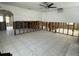 Open living room with tile flooring and exposed framing, offering potential for a customized design at 3207 S De Bazan Ave, St Pete Beach, FL 33706