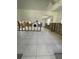 Large living room featuring tile floors and an open layout primed for upgrades at 3207 S De Bazan Ave, St Pete Beach, FL 33706