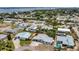 An aerial view of the neighborhood highlighting waterfront views, community features, and nearby homes at 323 48Th Nw St, Bradenton, FL 34209