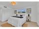 Bright bedroom featuring a neutral color palette and a ceiling fan at 323 48Th Nw St, Bradenton, FL 34209