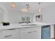 Bright, newly remodeled kitchen featuring pendant lighting and white countertops at 323 48Th Nw St, Bradenton, FL 34209