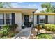 Charming home featuring a well-maintained front yard and a welcoming entrance at 3366 Clover Leaf Ln, Land O Lakes, FL 34639