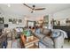 Spacious living room open to dining area and kitchen offers comfortable seating and stylish decor at 3366 Clover Leaf Ln, Land O Lakes, FL 34639