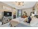 Comfortable main bedroom featuring a ceiling fan and an exterior view at 3366 Clover Leaf Ln, Land O Lakes, FL 34639
