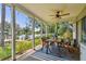Screened-in patio with view of the lake at 3366 Clover Leaf Ln, Land O Lakes, FL 34639