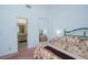 Comfortable main bedroom featuring ensuite bath for easy access at 34507 Cedarfield Dr, Dade City, FL 33523