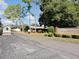 A welcoming entrance to the Whispering Oaks Estates Golf and Country Club at 34507 Cedarfield Dr, Dade City, FL 33523