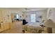Well-lit bedroom with a ceiling fan, comfortable furnishings, and a calming ambiance at 3505 Tarpon Woods Blvd # I407, Palm Harbor, FL 34685