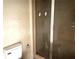 Bathroom with a shower stall and toilet at 403 E Carolina Ave, Plant City, FL 33563