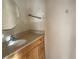 A bathroom with a vanity and round mirror at 403 E Carolina Ave, Plant City, FL 33563