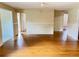 Spacious living room with wood floors ready for customization at 403 E Carolina Ave, Plant City, FL 33563