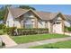 Charming home with a manicured lawn, mature shrubs, and an inviting front facade showcasing its curb appeal at 4655 Wallingford Ct # 4655, New Port Richey, FL 34655