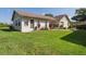 Charming home exterior with well-manicured lawn and a beautiful landscape at 4655 Wallingford Ct # 4655, New Port Richey, FL 34655