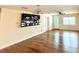 Living room boasts gleaming hardwood floors, ample natural light, and contemporary fixtures at 4811 Haines N Rd, St Petersburg, FL 33714