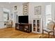 Inviting living room featuring hardwood floors, stylish furnishings, and plenty of natural light at 4913 N Central Ave, Tampa, FL 33603