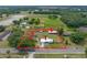Aerial view of the property highlighting the home, outbuildings, and the large surrounding lot at 5109 Horton Rd, Plant City, FL 33567